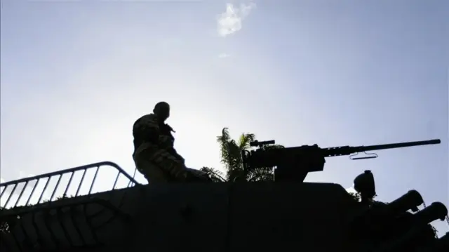 Venezuela mobilizes 200,000 troops as US carrier nears

