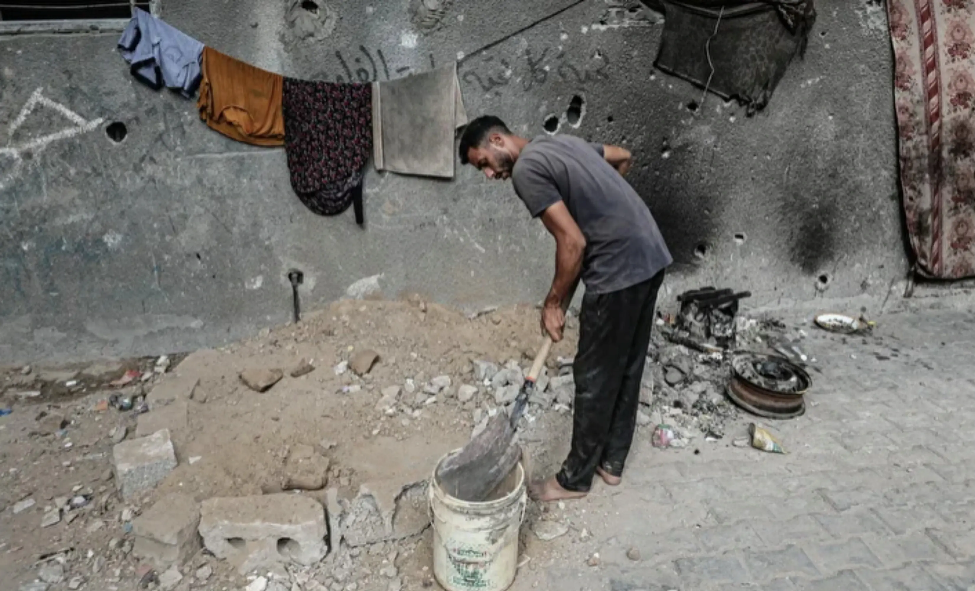 Palestinians rebuild homes using bricks salvaged from rubble in Gaza

