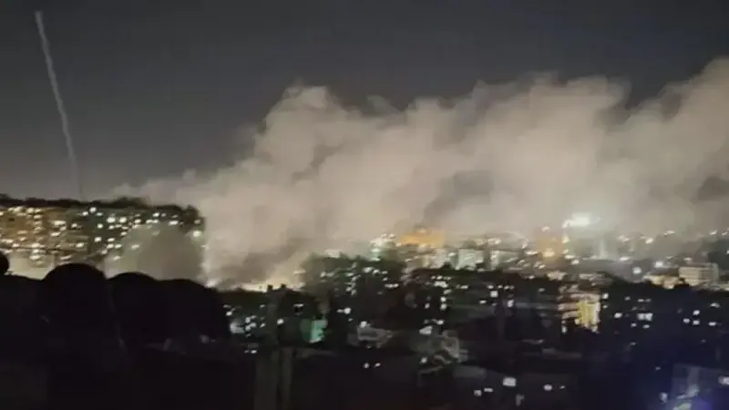 Şam'da üç katlı binaya füze isabet ettiği bildirildi.