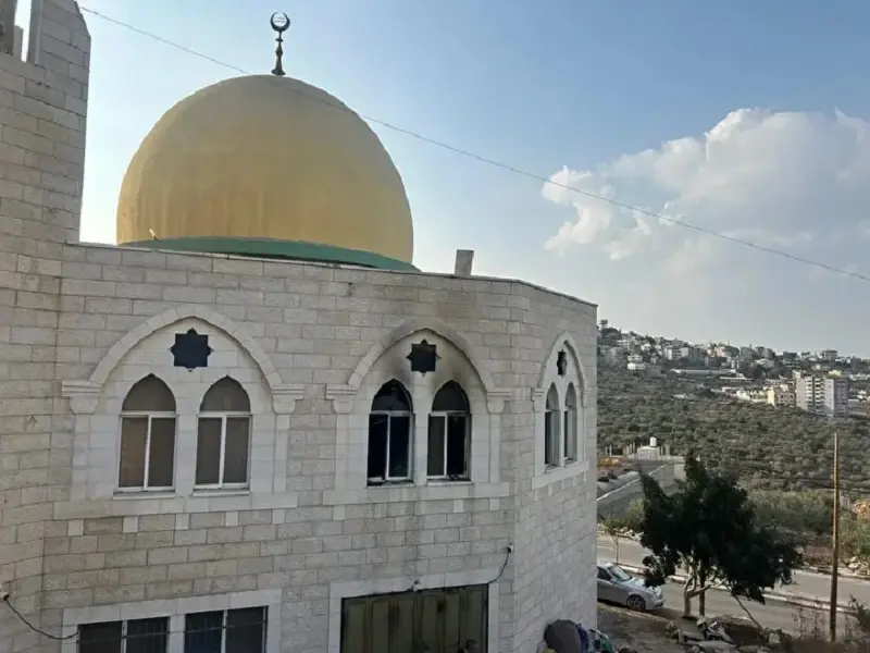 Israeli settlers torch mosque in West Bank, sparking condemnation