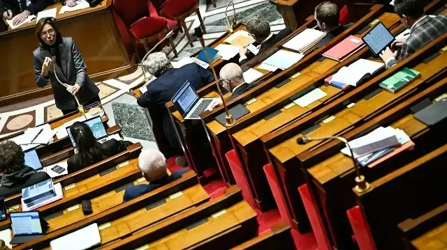 France's Public Accounts Minister Amelie de Montchalin speaks during a debate session on the draft budget law for 2026 at the Assemblee Nationale, France's Parliament lower house, in Paris on November 19, 2025.