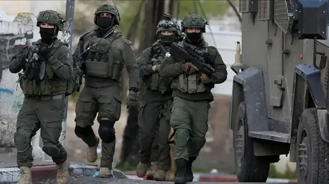 Israeli forces detain Palestinians in West Bank raids, including lawmaker