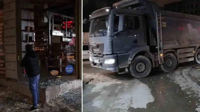 Hafriyat kamyonunun patlayan lastiği iş yerinin camlarını kırdı