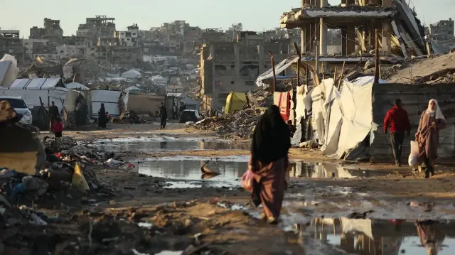 Heavy rains flood makeshift camps for displaced Palestinians in Gaza