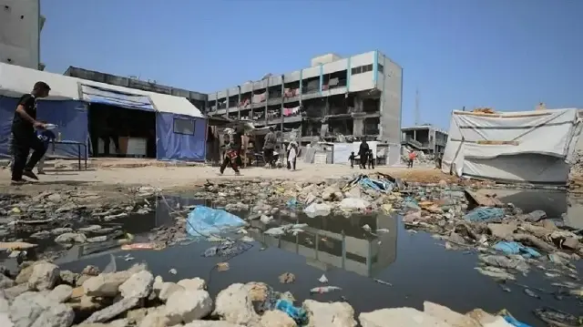 Gaza children create makeshift basketball court amid displacement camp