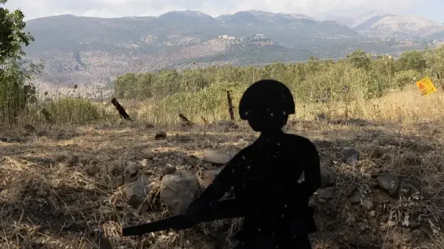 Hezbollah warns of retaliation for Israeli killing of senior commander