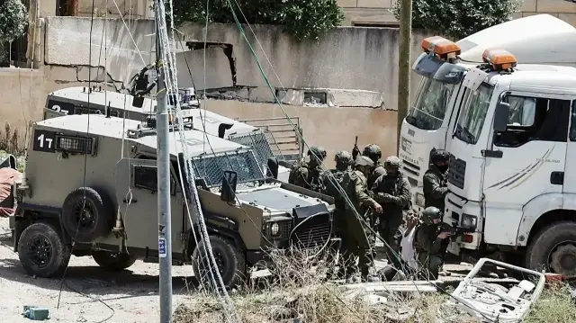 جيش الاحتلال الإسرائيلي يعتقل 13 فلسطينيا في الضفة