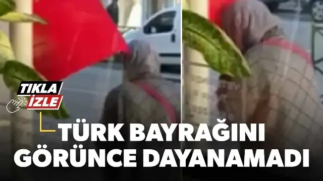 Türk bayrağını defalarca öpen teyzenin görüntüsü yürekleri ısıttı