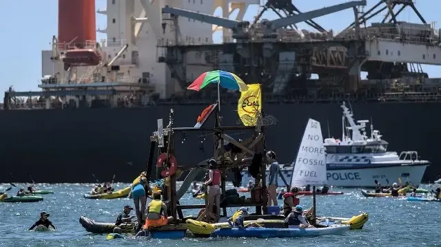 Australian police arrest 141 climate protesters blocking coal port