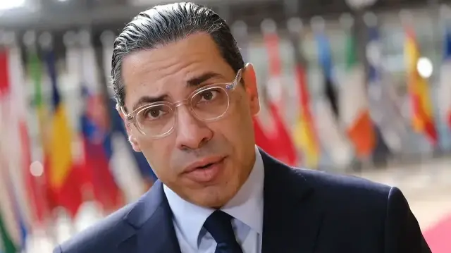 Министр иностранных дел Константинос Комбос.