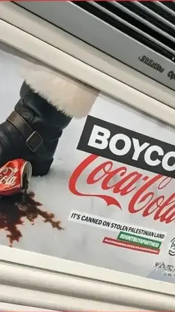 Boycott Coca-Cola ads seen in London underground