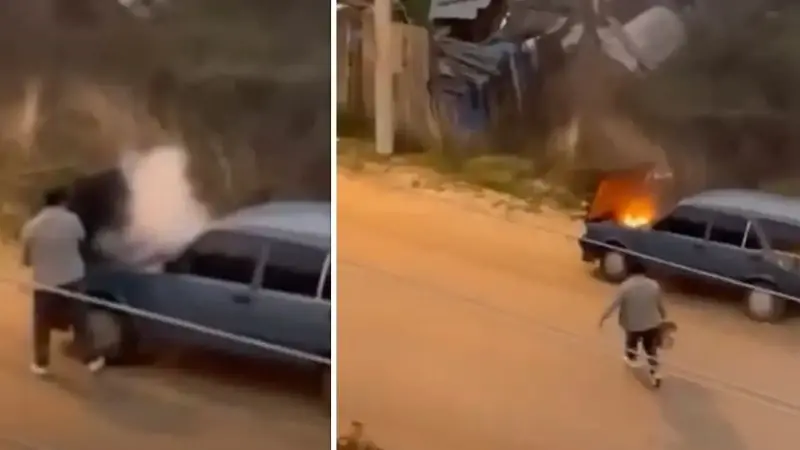 Alev alev yanan aracını kovayla su döküp söndürdü