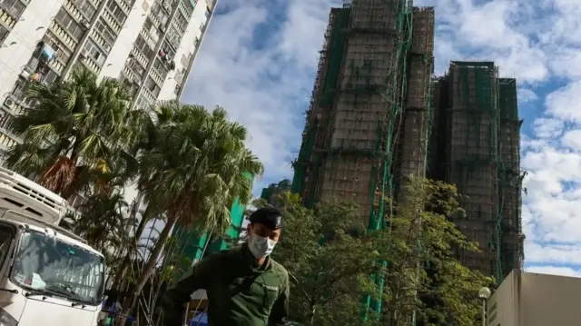 Hong Kong searches for 31 missing after deadly residential fire