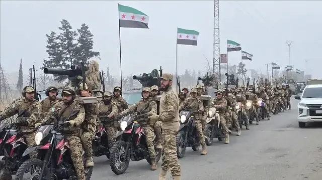 الشرع حضر أحدها.. عروض عسكرية في سوريا بذكرى إسقاط الأسد 