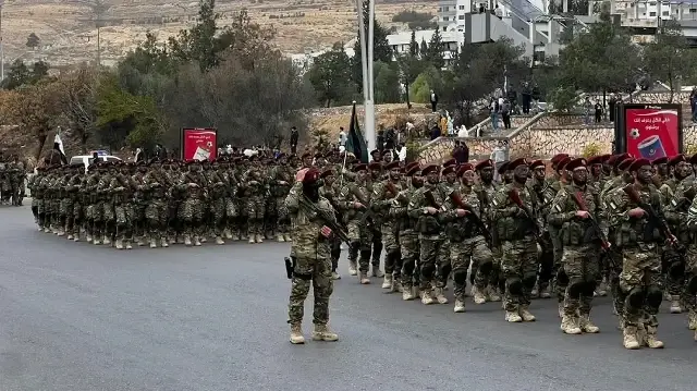 Syrian provinces hold military parades marking anniversary of Assad's fall