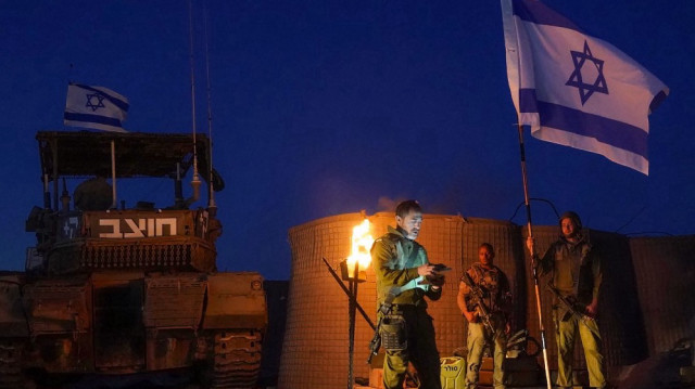 Cette photo diffusée par l'armée israélienne le 13 mai 2024 montre des soldats israéliens opérant dans la bande de Gaza.