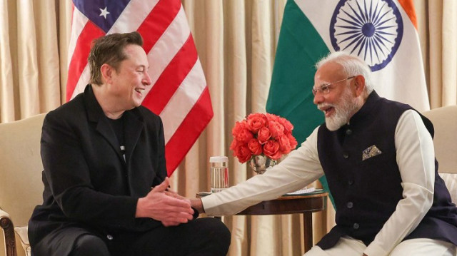 Head of the Department of Government Efficiency (D.O.G.E.) and CEO of SpaceX, Tesla, and X Elon Musk (L) meets with Indian Prime Minister Narendra Modi (R) at Blair House in Washington DC, USA on February 13, 2025.