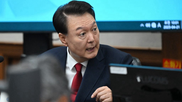 L'ancien président sud-coréen Yoon Suk Yeol assiste à son procès pour insurrection dans la salle d'audience du tribunal central de Séoul, le 21 avril 2025.