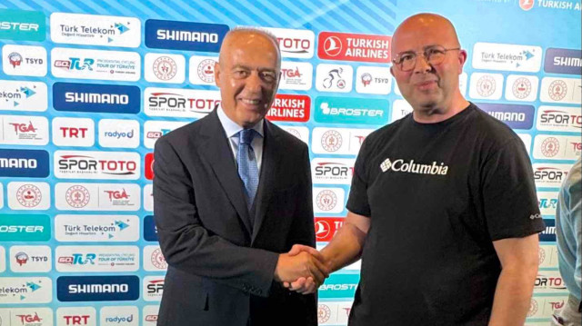 Türkiye Bisiklet Federasyonu Başkanı Emin Müftüoğlu ve muhabirimiz Metin Kanlıkoyak