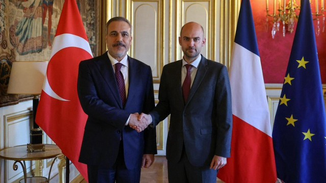 Turkish Foreign Minister Hakan Fidan (L) meets French Minister for Europe and Foreign Affairs Jean-Noel Barrot (R) during his official visit in Paris, France on April 2, 2025.