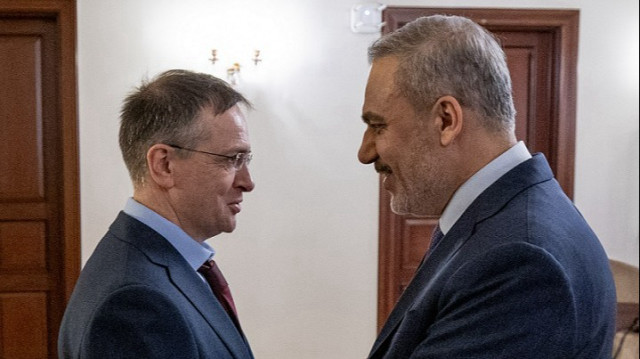 Turkish Foreign Minister Hakan Fidan (R) meets with Russian Presidential Advisor Vladimir Medinskiy (L) at the Presidential Dolmabahce Office in Istanbul, Türkiye, on May 15, 2025.