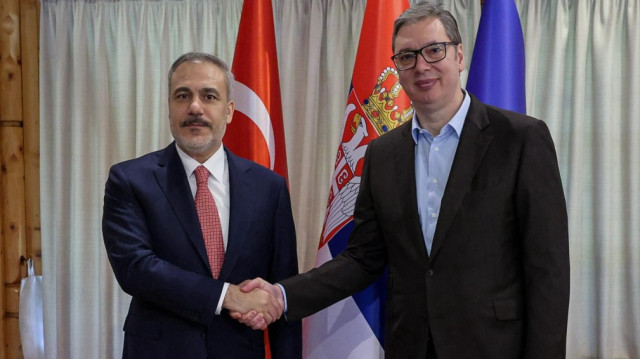 Turkish Foreign Minister Hakan Fidan (L) meets with Serbian President Aleksandar Vucic (R) in Belgrade, Serbia on May 19, 2025.