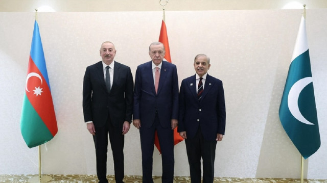 Turkish President Recep Tayyip Erdogan (M), Azerbaijani President Ilham Aliyev (L) and Pakistani Prime Minister Shahbaz Sharif (R)