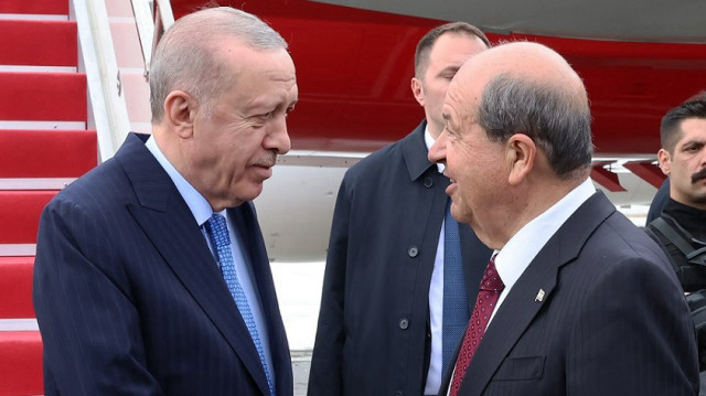 Türkiye's President Recep Tayyip Erdogan and TRNC President Ersin Tatar at Ercan Airport during a ceremony.