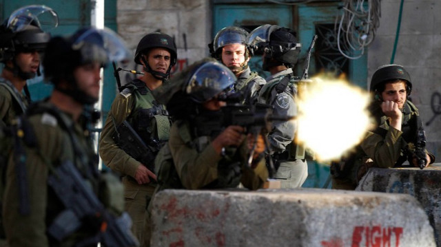 إصابة فلسطيني ومتضامن أجنبي باعتداءات لمستوطنين بالضفة