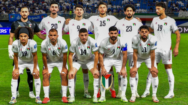 Les joueurs de la Palestine avant le match des éliminatoires asiatiques de la Coupe du monde 2026 entre le Koweït et la Palestine, au stade international Jaber Al-Ahmad à Koweït City, le 5 juin 2025.
