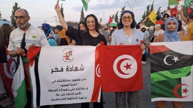 مئات التونسيين يستقبلون "قافلة الصمود" العائدة من ليبيا