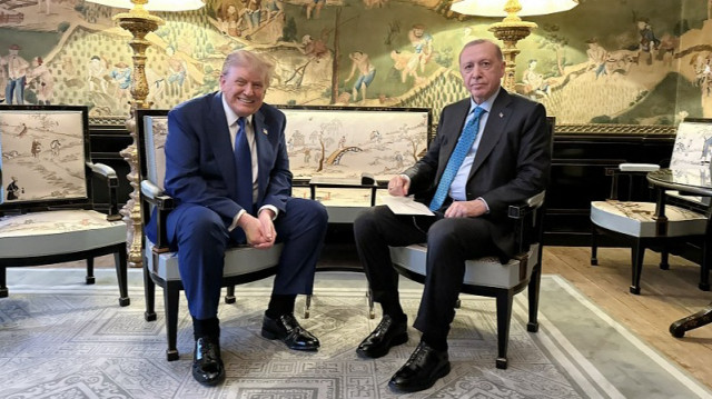 Turkish President Recep Tayyip Erdogan (R) and US President Donald Trump (L) meet as part of the NATO Summit in The Hague, the Netherlands on June 24, 2025.