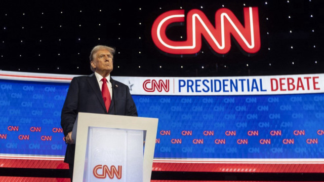 L'ancien président des États-Unis et candidat républicain à l'élection présidentielle, Donald Trump, participe au premier débat présidentiel des élections de 2024 avec le président des États-Unis, Joe Biden, dans les studios de CNN à Atlanta (Géorgie), le 27 juin 2024.