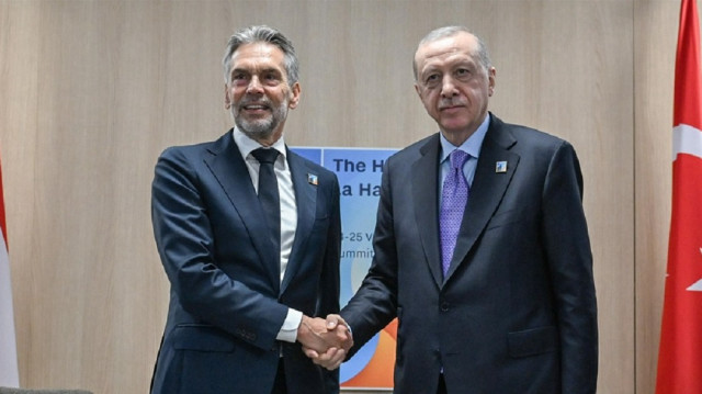 Turkish President Recep Tayyip Erdogan (R) shakes hands with Dutch Prime Minister Dick Schoof (L) during their meeting within the NATO Heads of State and Government Summit in The Hague, Netherlands on June 25, 2025.