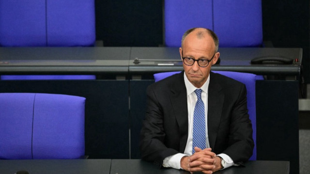  Le chancelier allemand nouvellement élu, Friedrich Merz, est assis seul sur le siège du chancelier après avoir prêté serment lors d'une session de prestation de serment après un second tour de scrutin au Bundestag (chambre basse du parlement) à Berlin, le 6 mai 2025.