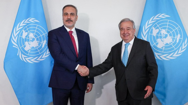 Turkish Foreign Minister Hakan Fidan (L) is welcomed by United Nations Secretary-General Antonio Guterres (R) at the UN Headquarters in New York, United States on July 16, 2025.