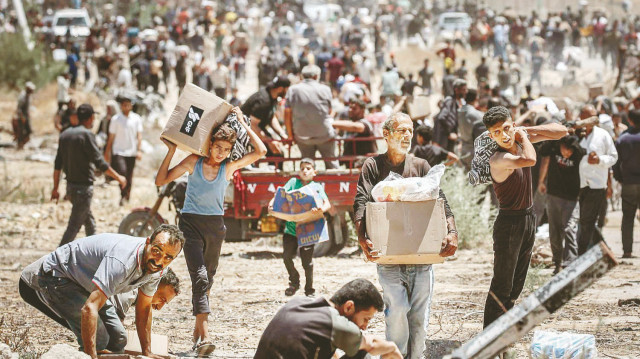 Gazze'de bugüne kadar yaklaşık 851 Filistinli yiyecek bulma umuduyla gittiği insani yardım merkezlerinde can verdi.