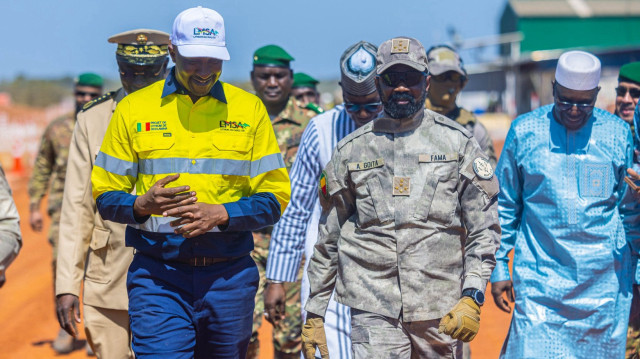 Le Président de la Transition au Mali, le Général Assimi Goita (au milieu), lors de l'inauguration de la mine de lithium de Goulamina, au Mali, le 16 décembre 2024.