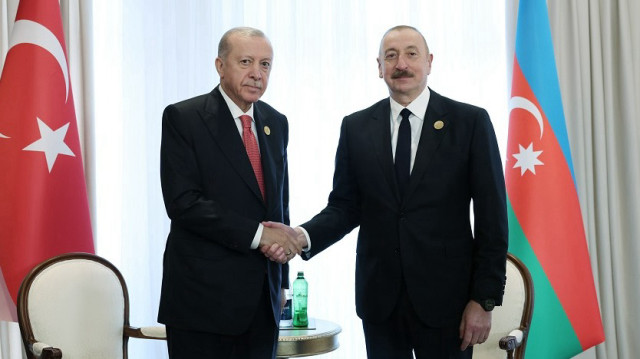 Turkish President Recep Tayyip Erdogan (L) meets with Azerbaijani President Ilham Aliyev (R) in Fuzuli, Azerbaijan on July 04, 2025.