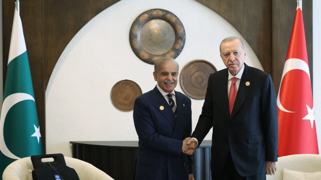 Turkish President Recep Tayyip Erdogan (R) and Pakistan Prime Minister Shahbaz Sharif (L) hold a meeting after attending the 17th Summit of the Economic Cooperation Organization in Khankendi, Azerbaijan on July 4, 2025. (AA)