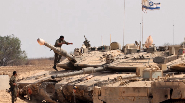 Les troupes israéliennes se déploient à la frontière avec la bande de Gaza, le 13 août 2025, alors que la guerre entre Israël et le groupe militant palestinien Hamas se poursuit.
