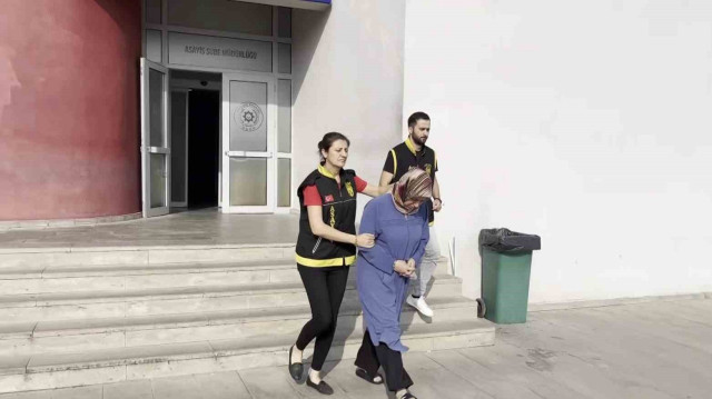 Eşini öldürmekle suçlanan kadın.