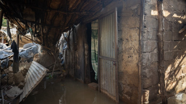 Des maisons sont submergées dans une zone inondée du quartier de Badalabougou à Bamako, le 3 octobre 2024. De fortes pluies ont récemment provoqué de graves inondations dans tout le Sahel, touchant les populations de plusieurs pays.