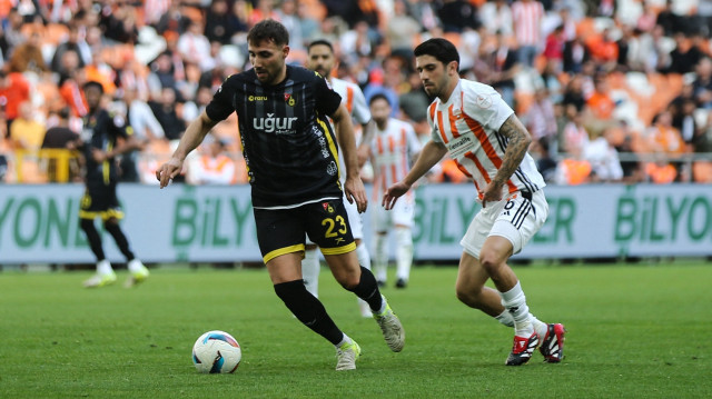 Trendyol 1.Lig'in 31. haftasında Adanaspor ile Uğur Okulları İstanbulspor, Yeni Adana Stadyumu'nda karşılaştı. Bir pozisyonda Adanasporlu Mirza Cihan (6) ile İstanbulsporlu Okan Erdoğan (23) mücadele etti.

