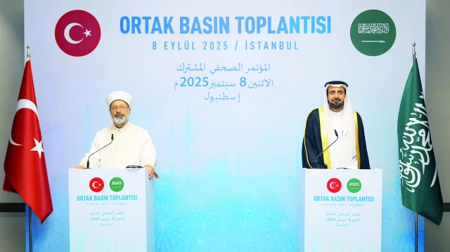 Ali Erbaş ve Tevfik er-Rabia.