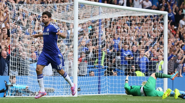 Chelsea's Diego Costa celebrates after scoring a goal against Aston Villa during their English Premier League soccer match at Stamford Bridge in London, September 27, 2014.  