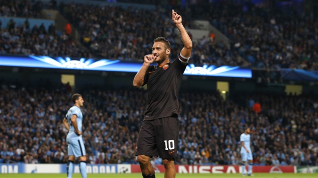 AS Roma's Francesco Totti celebrates scoring a goal against Manchester City during their Champions League soccer match at the Etihad Stadium in Manchester.