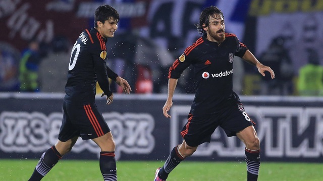  Veli Kavlak (R) of Besiktas celebrates with his teammate Necip Uysal (L) after scoring his team's first goal during the UEFA Europa League Group C soccer match at the FK Partizan stadium on October 23, 2014.