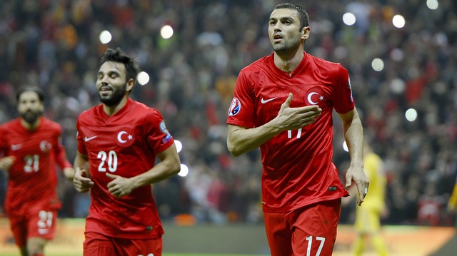 Burak Yilmaz of Turkey (R) celebrates after scoring a goal during the Euro 2016 Qualifying Group A match between Turkey and Kazakhstan.