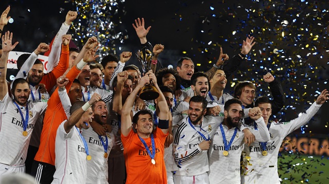 Players of Real Madrid pose with the trophy after the FIFA Club World Cup Final between Real Madrid and San Lorenzo at Marrakech Stadium on December 20, 2014 in Marrakech, Morocco. 